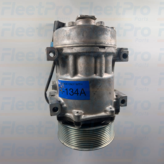 Side view showing mounting points of Carrier 46-50006-00 compressor