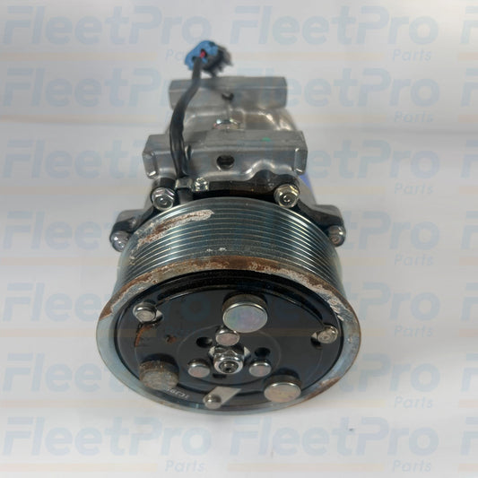 Side view showing mounting points of Carrier 46-50006-00 compressor