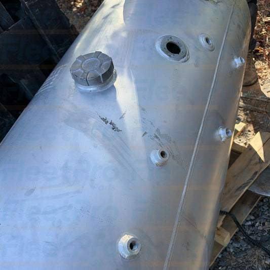 Threaded aluminum fuel filler neck and heavy-duty cap interface detail on International 4065910C1 fuel tank