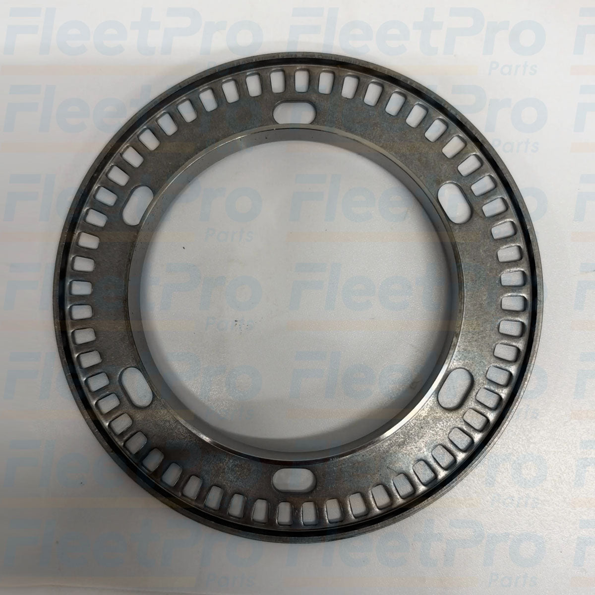 Close-up view of precision CNC-stamped magnetic tone teeth on Isuzu GM 330-1663 sensor rotor