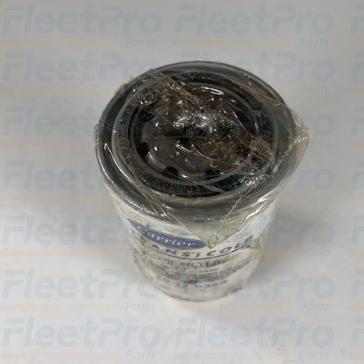 Close-up view of threaded center port and nitrile sealing gasket on Carrier 20-11-6228 filter