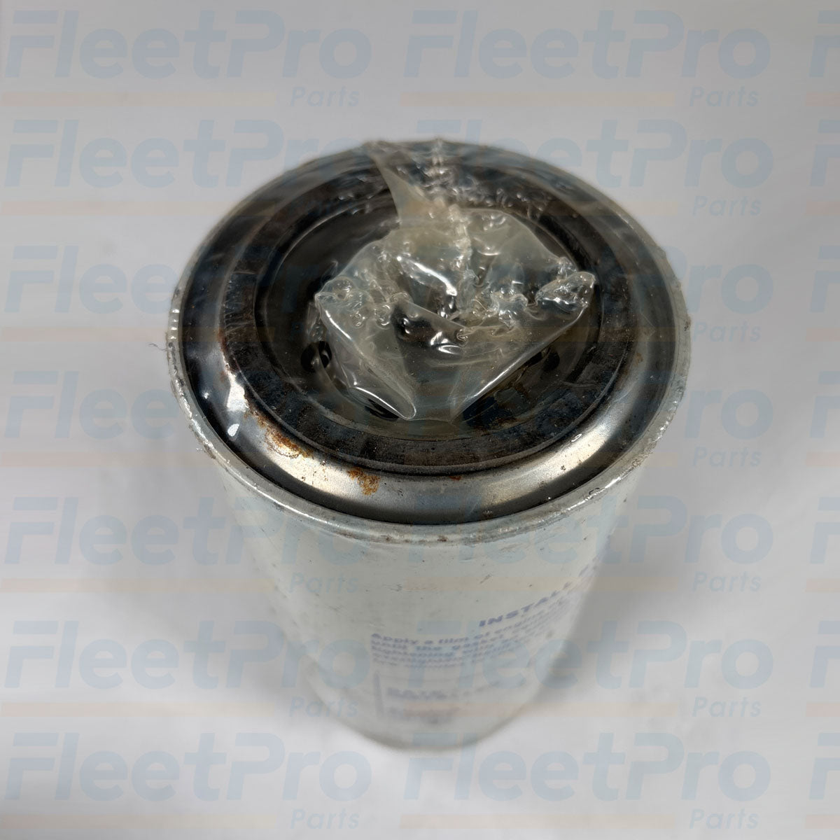 Close-up view of threaded center mounting port and nitrile sealing gasket on Carrier 30-00304 filter