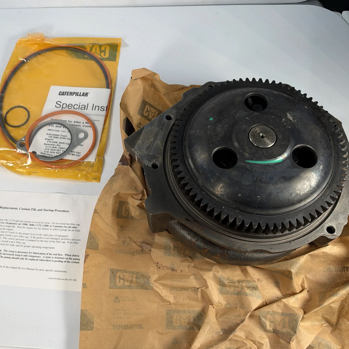 Genuine Caterpillar 10R-8660 remanufactured heavy-duty water pump assembly full front view