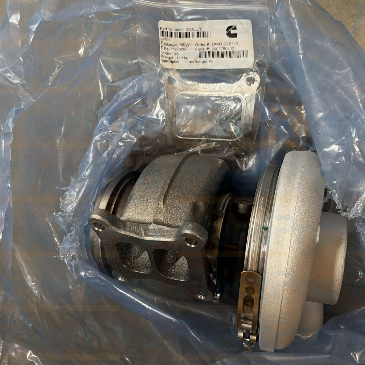Compressor air inlet housing detail on Cummins 3800471RX HX55 turbocharger