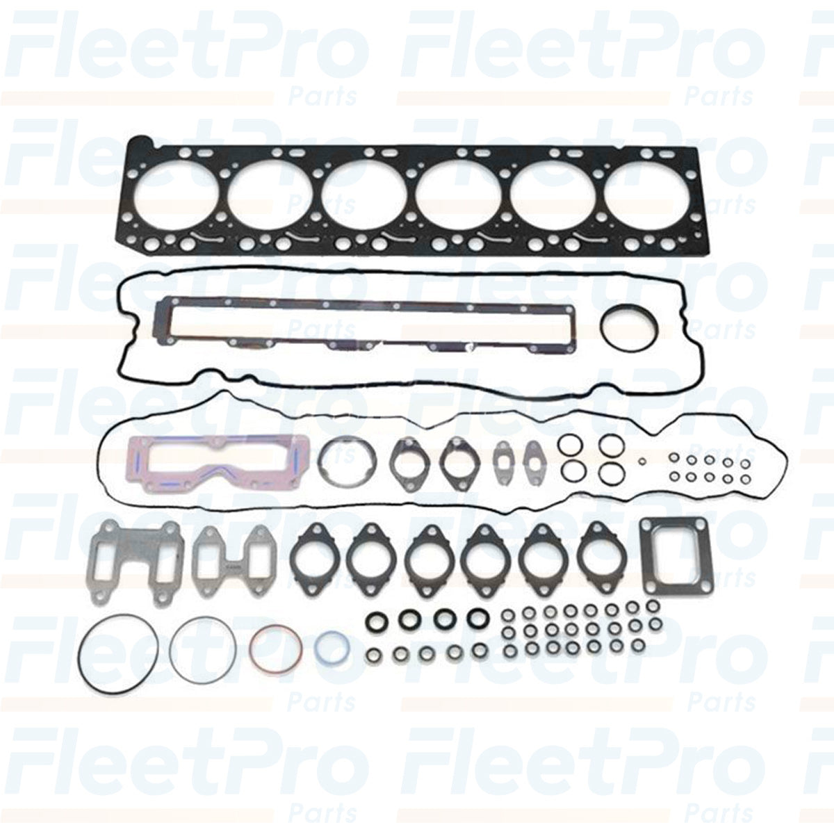 Components of Cummins 5473339 Head Gasket Kit laid out, showing gaskets and seals