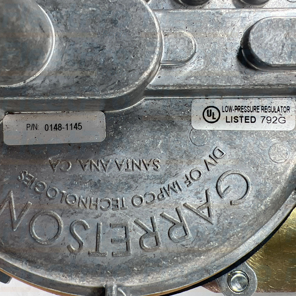 Side profile angle showing cast aluminum housing thickness and seam seal on 0148-1145