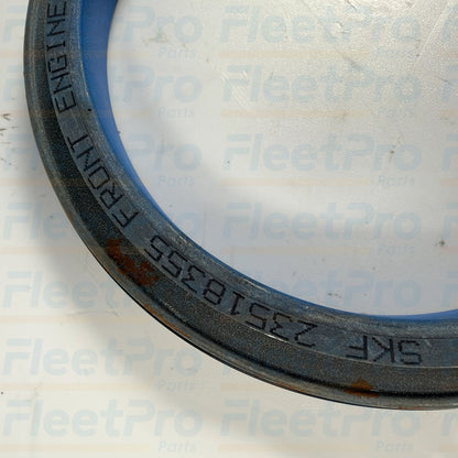 Outer metal casing and rubber-coated dust wiper lip detail on Detroit Diesel 23518355 front main seal