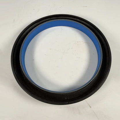 Close-up view of internal fluoroelastomer sealing lip and stainless steel garter spring on DDE 23518355