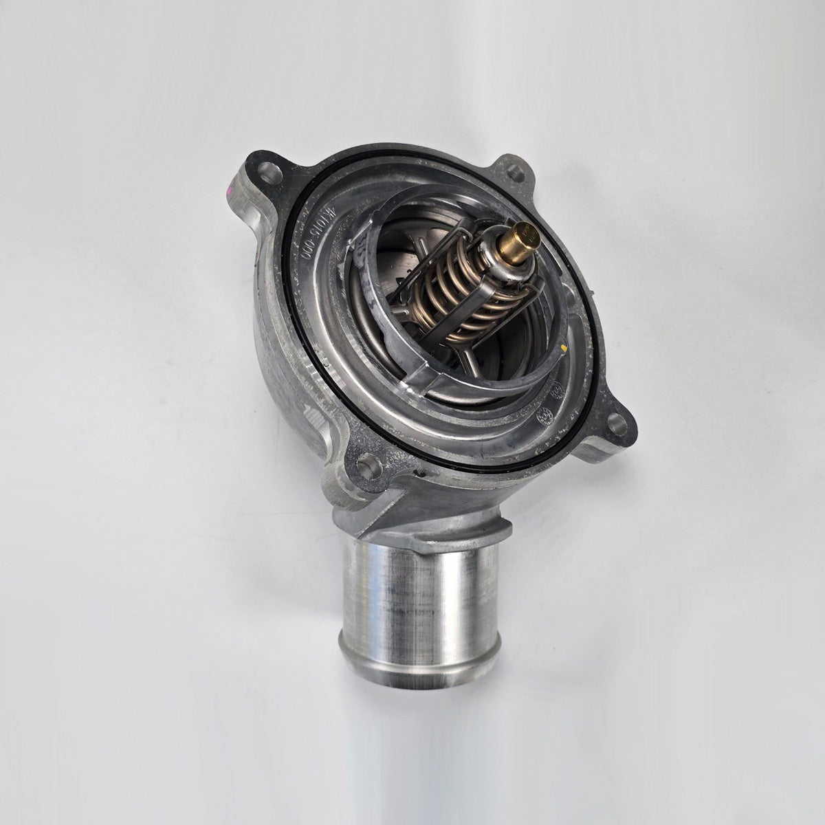 Side profile of Detroit Diesel A4722003715 coolant thermostat assembly