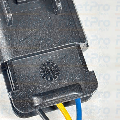 Close-up view of weather-sealed electrical connector terminal plug on Dorman 901-5207 clutch switch