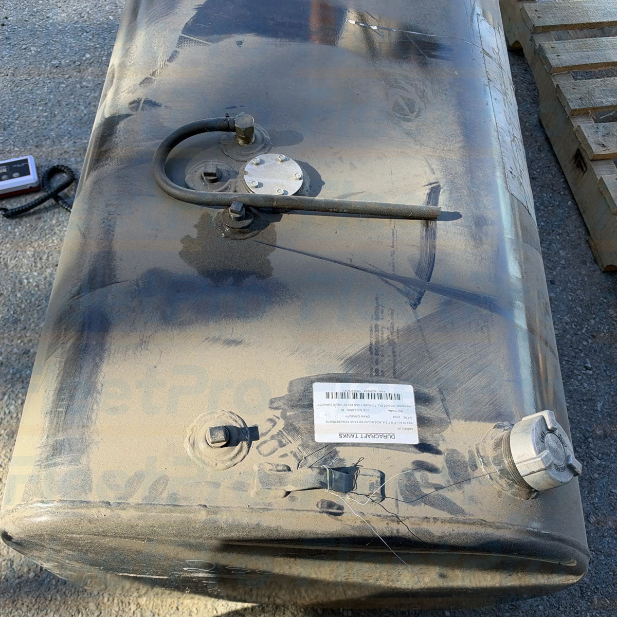 Close-up view of precision machined fuel sending unit and draw tube mounting ports on DuraCraft 2508978C93