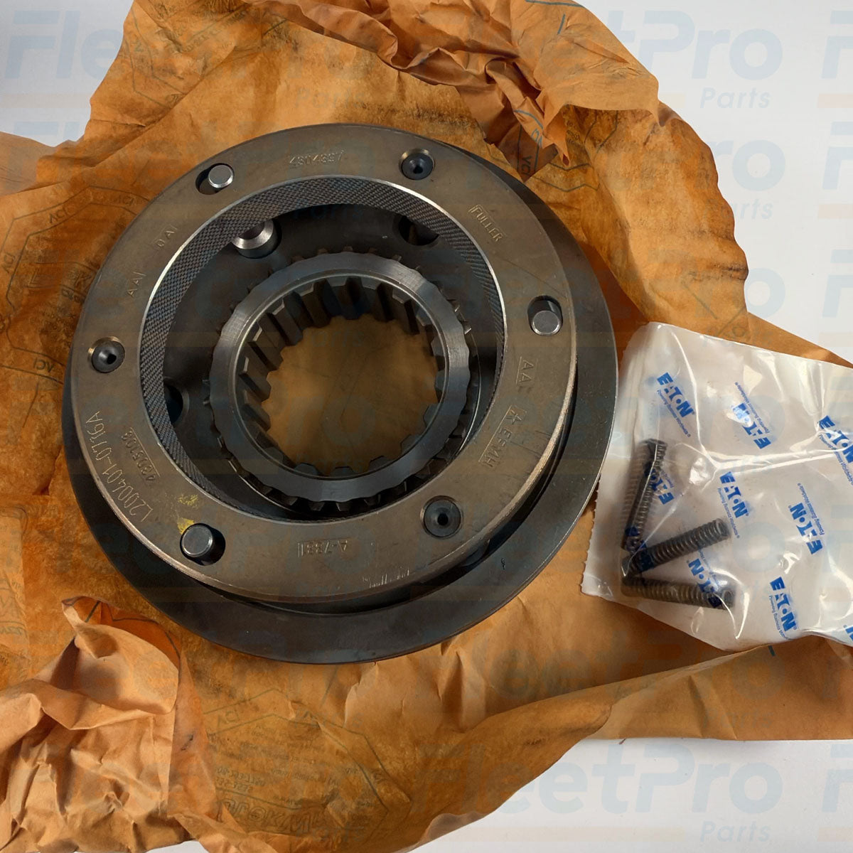 Close-up view of precision induction-hardened engagement spline teeth on Eaton FULK3495 sliding clutch