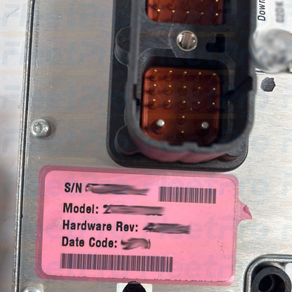 Serial tag and factory remanufactured part label on Eaton K-373RX transmission controller
