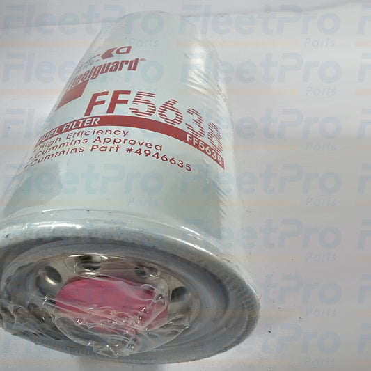 Close-up view of precision threaded center mounting port and inlet holes on Fleetguard FF5638 fuel filter
