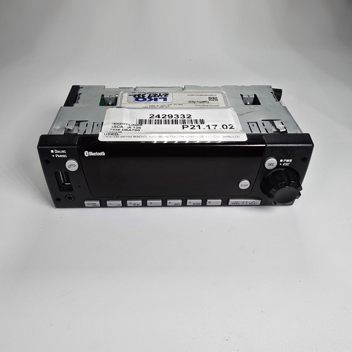 Front view of Freightliner radio 2429332 showing display and controls