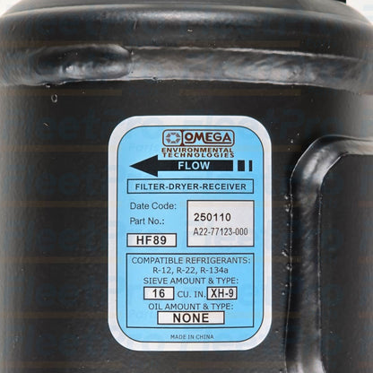 Close-up of label details and air fittings on Freightliner A/C Air Dryer A22-77123-000