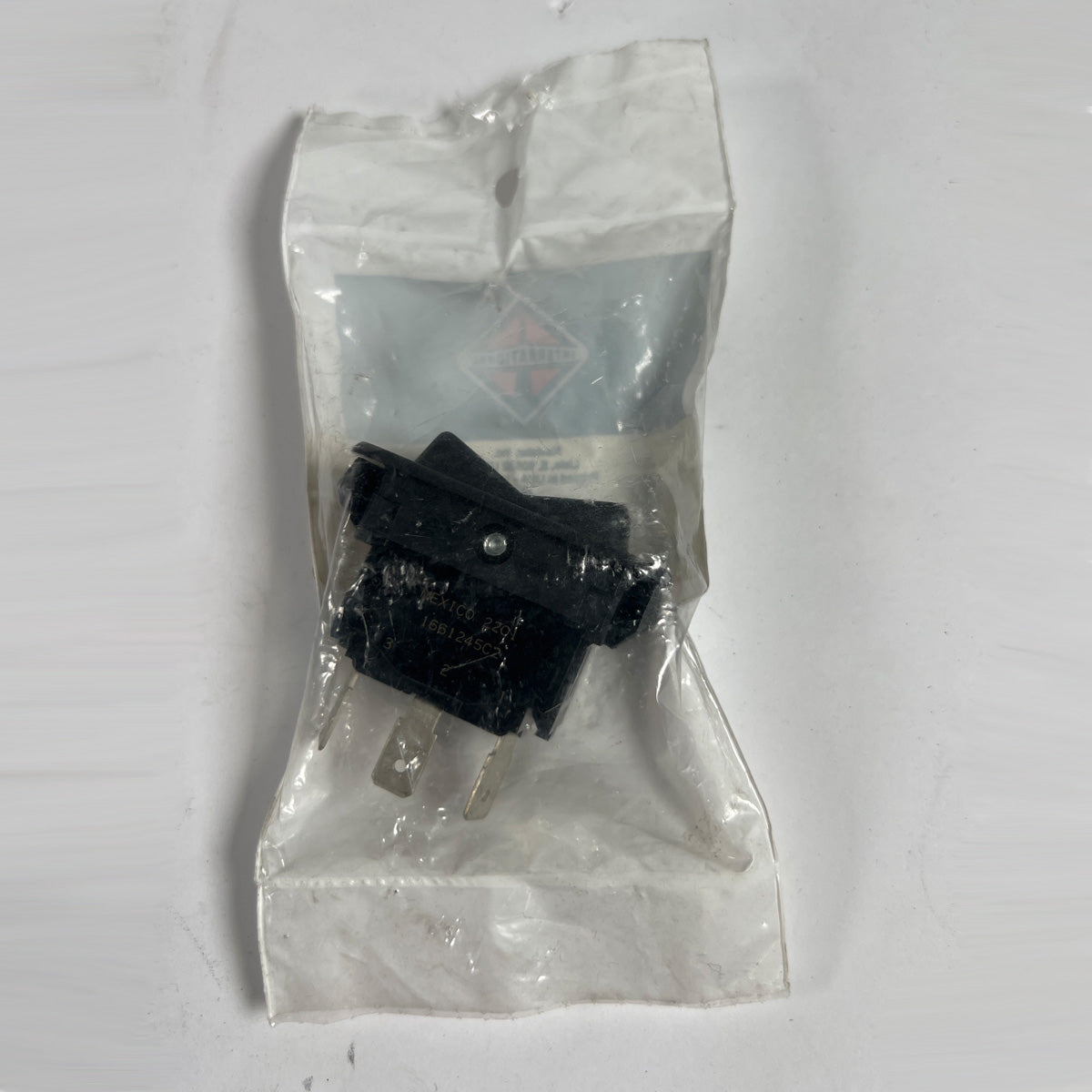International 1661245C2 cruise control switch front view