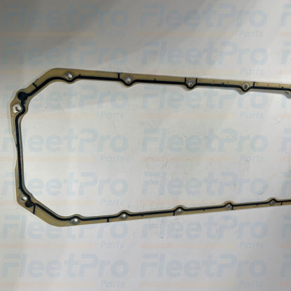 Detailed view of reinforced metal torque-limit stop eyelet hole on Navistar 1836197C1 gasket