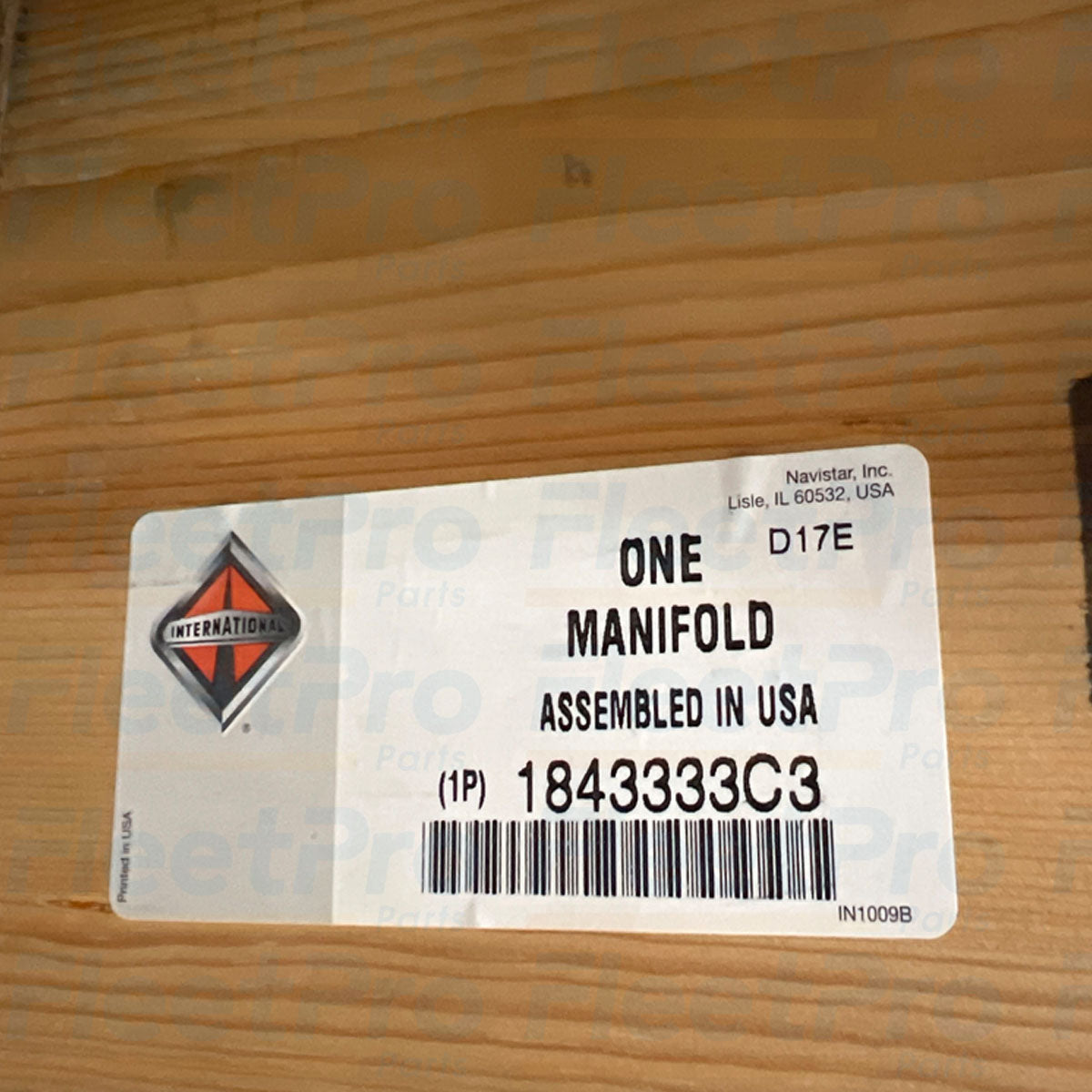 Protective packaging and genuine Navistar factory part label for 1843333C3 manifold