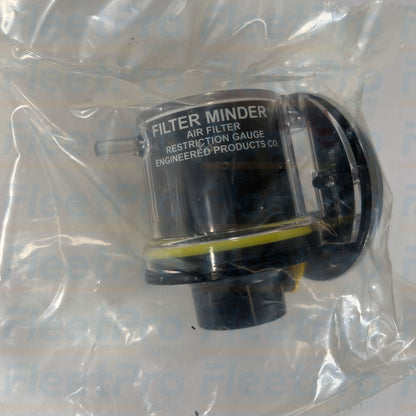 Close-up view of visual restriction scale and manual yellow reset button on International 2024677C91