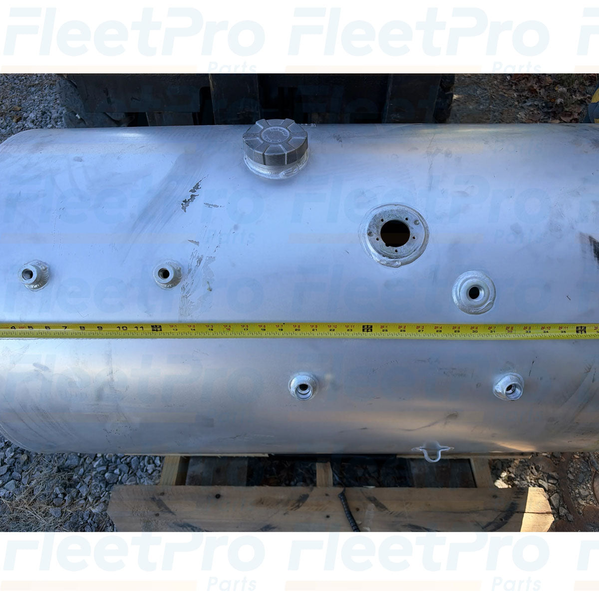 Close-up view of precision machined fuel level sending unit and draw tube mounting port on International 4065910C1