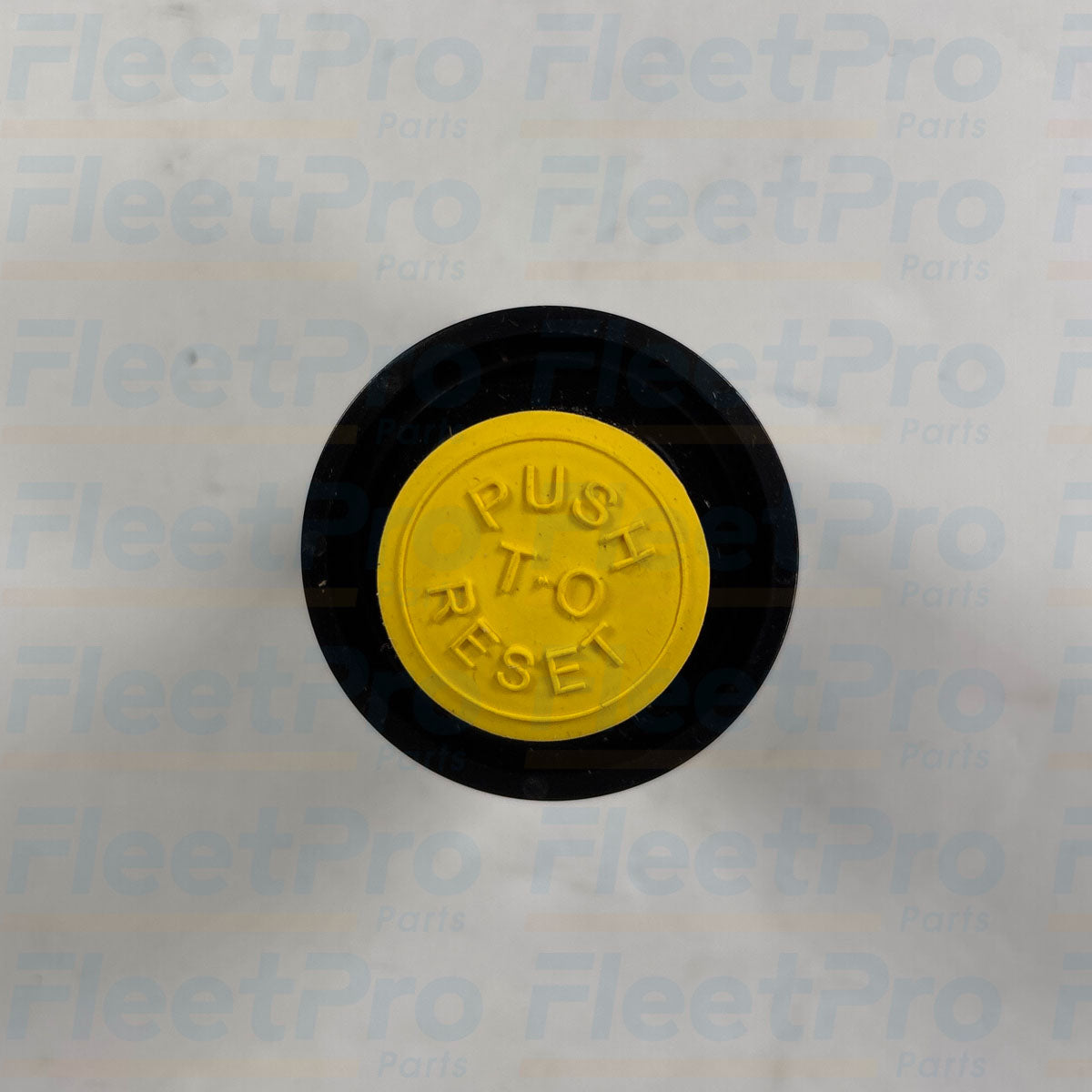 Close-up view of visual restriction scale and manual yellow reset button on International 539245C1
