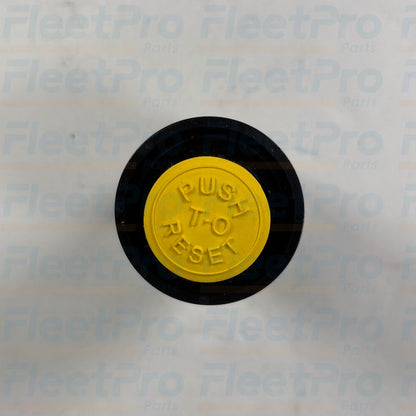 Close-up view of visual restriction scale and manual yellow reset button on International 539245C1