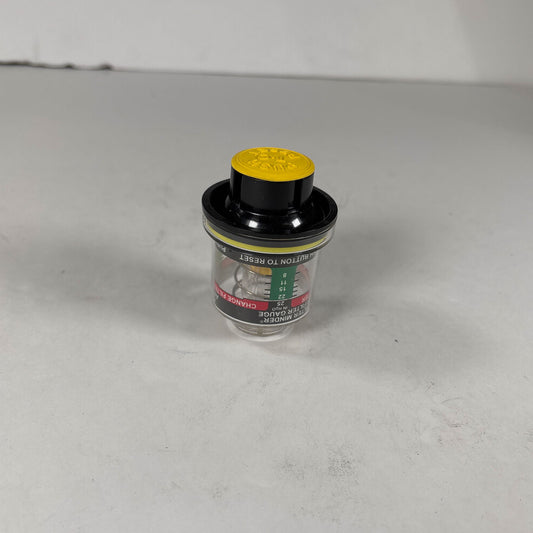 Threaded brass mounting fitting and suction port detail on International 539245C1 indicator gauge