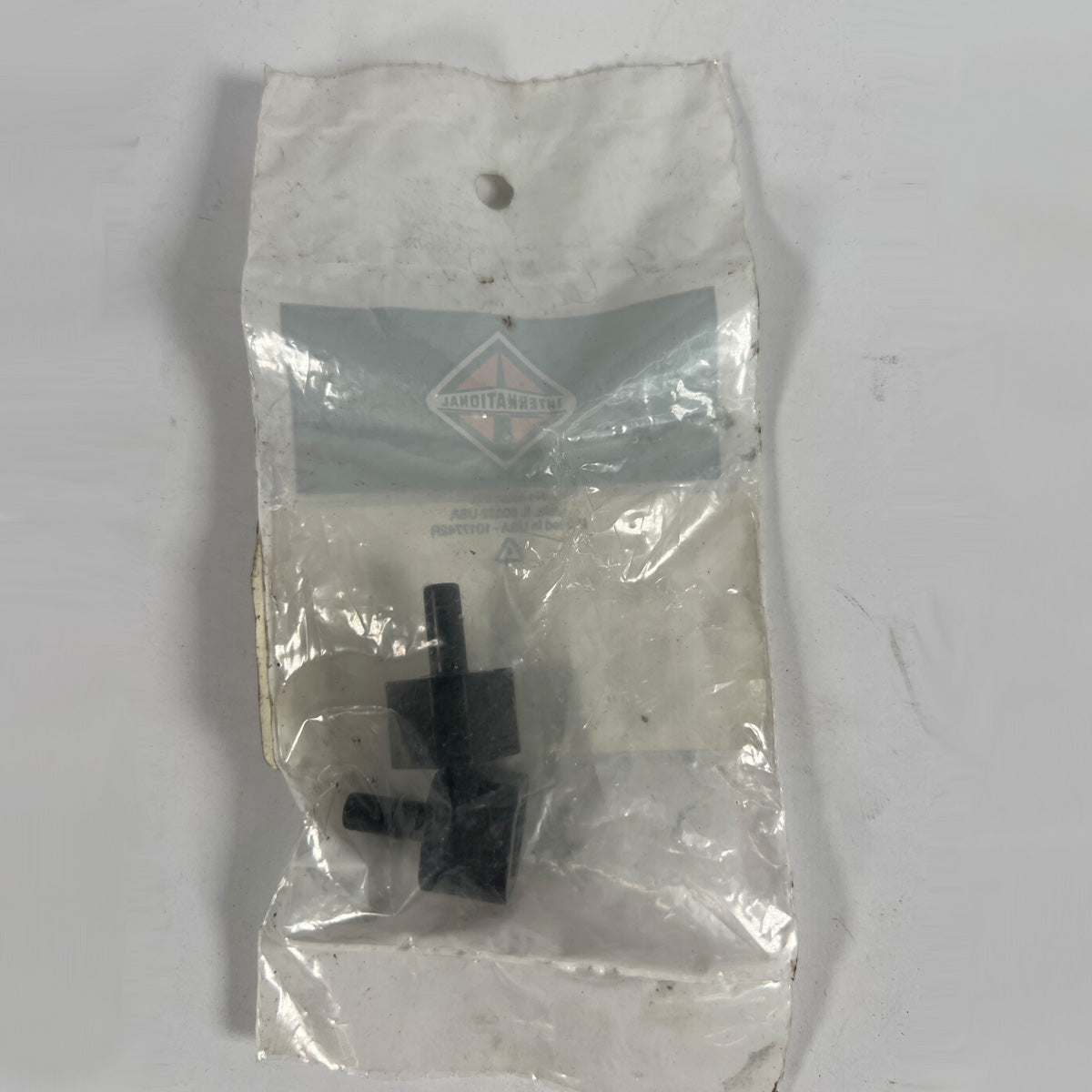 International 575147C1 washer block junction