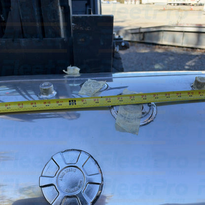 Threaded aluminum fuel filler neck and heavy-duty cap interface detail on International 6115003C91 fuel tank
