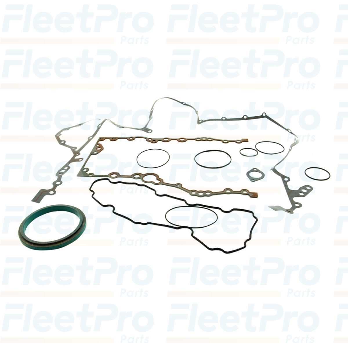 Components of International 7079534C91 front cover gasket kit laid out, showing various seals and gaskets