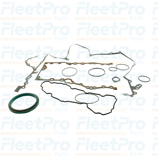 Components of International 7079534C91 front cover gasket kit laid out, showing various seals and gaskets
