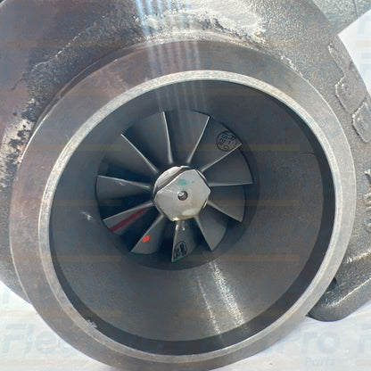 High-heat cast iron turbine exhaust inlet flange face on International 991535C91 turbocharger