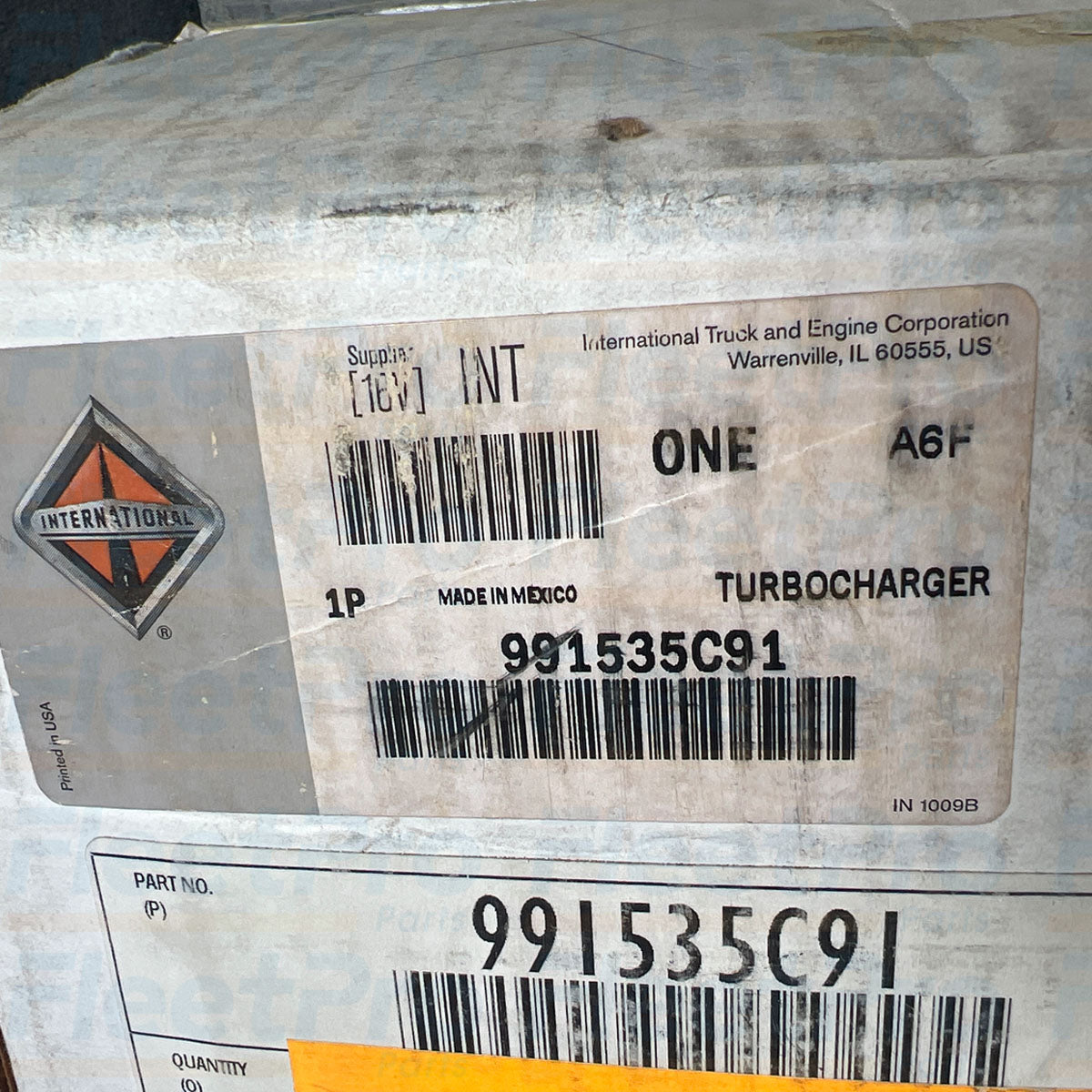 Factory shipping box packaging and genuine Navistar manufacturer part label for 991535C91