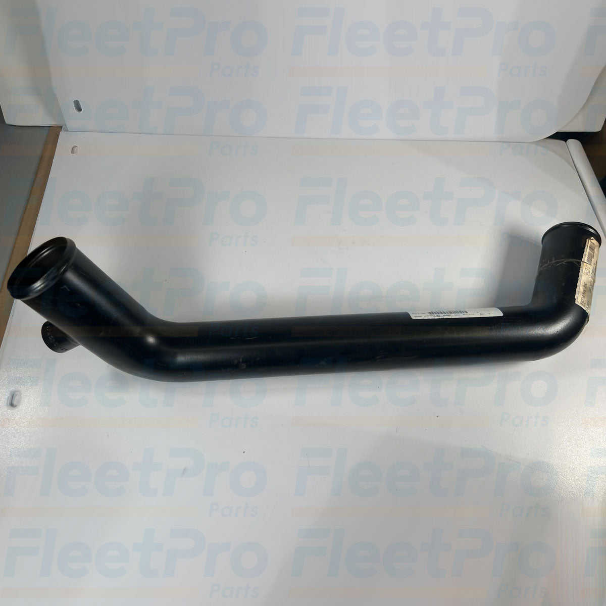 Close-up view of precision beaded hose retaining ends on Kenworth K181-5615 lower coolant pipe