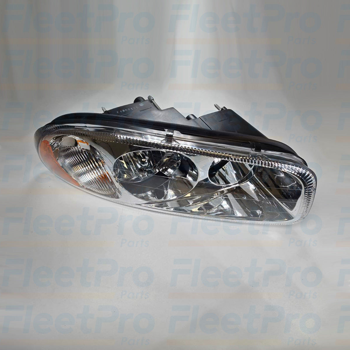 Close-up of Mack 888-5503 Passanger Side Headlight lens, showing clarity and detail