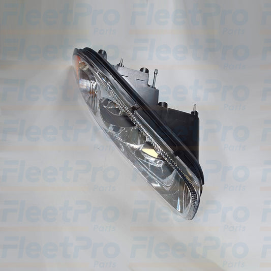 Side view of Mack 888-5503 headlight showing housing and lens details