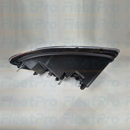 Bottom angle of Mack 888-5503 Passanger Side Headlight with mounting brackets visible