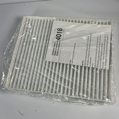 Microgard 4018 cabin air filter front view displaying white synthetic media