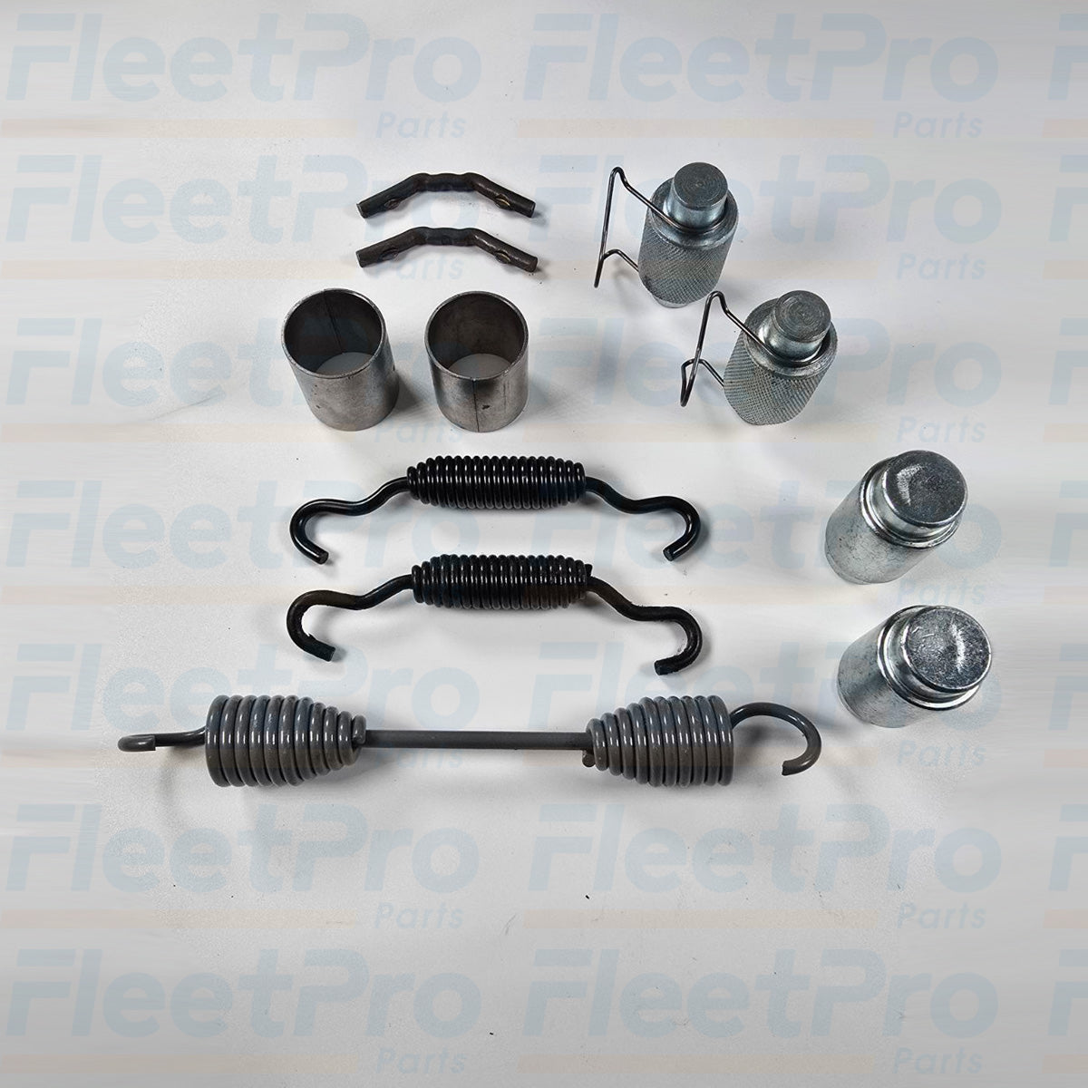 Side View Components of OTR4702 hardware kit laid out (springs, pins, clips)