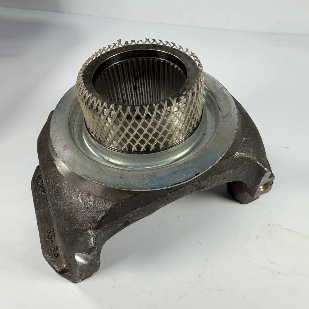 Genuine Spicer 6.3-4-5221-1X 1760 series half round 44-spline differential end yoke full front view