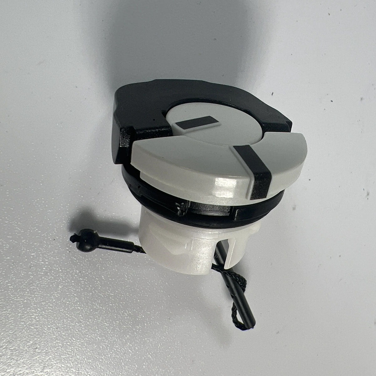 Genuine STIHL 0000-350-0537 toolless chain oil filler cap full front view