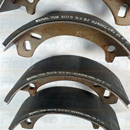 Replacement commercial turf equipment drum brake shoe set Toro part number 84-8600