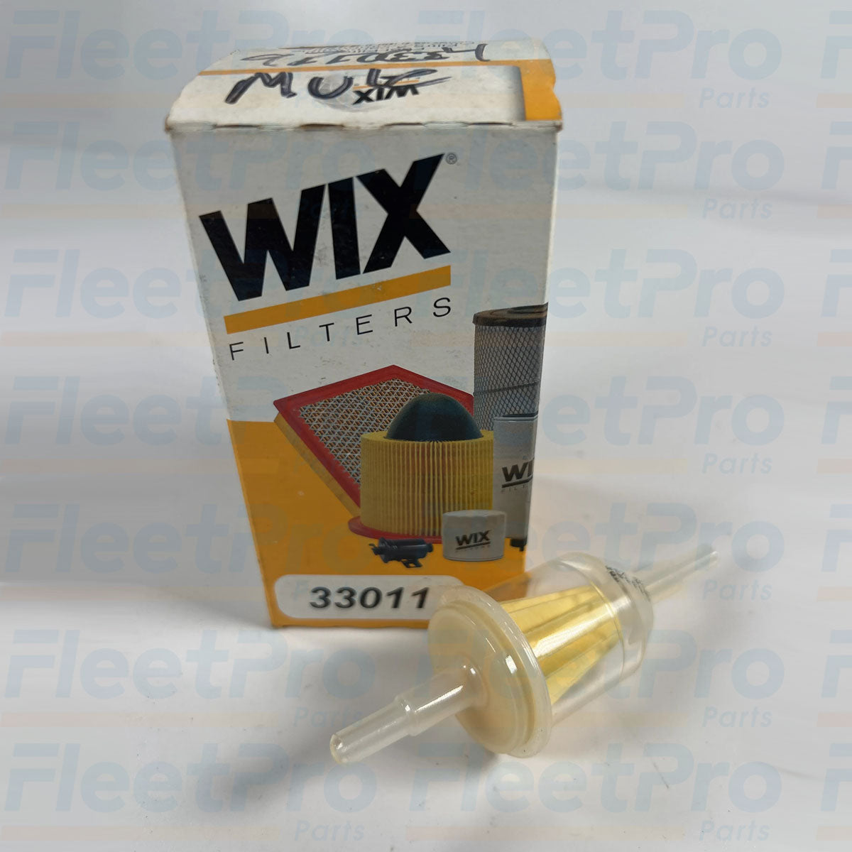 Close-up view of barbed nipple inlet fitting on Wix 33011 inline fuel filter