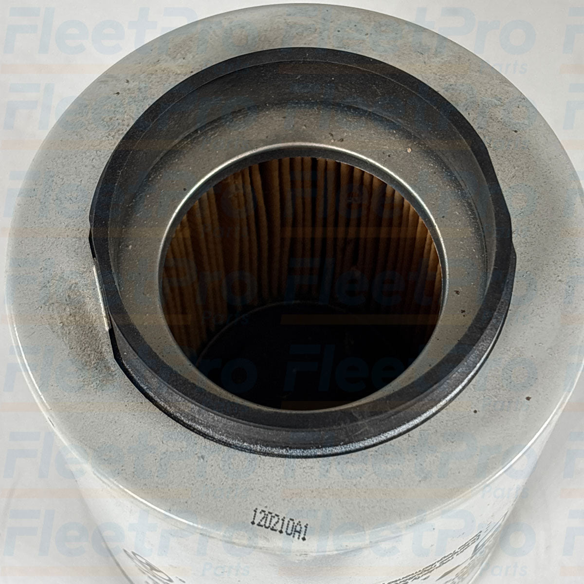 Close-up view of precision threaded center mounting bore and inlet ports on Wix 33232 fuel filter