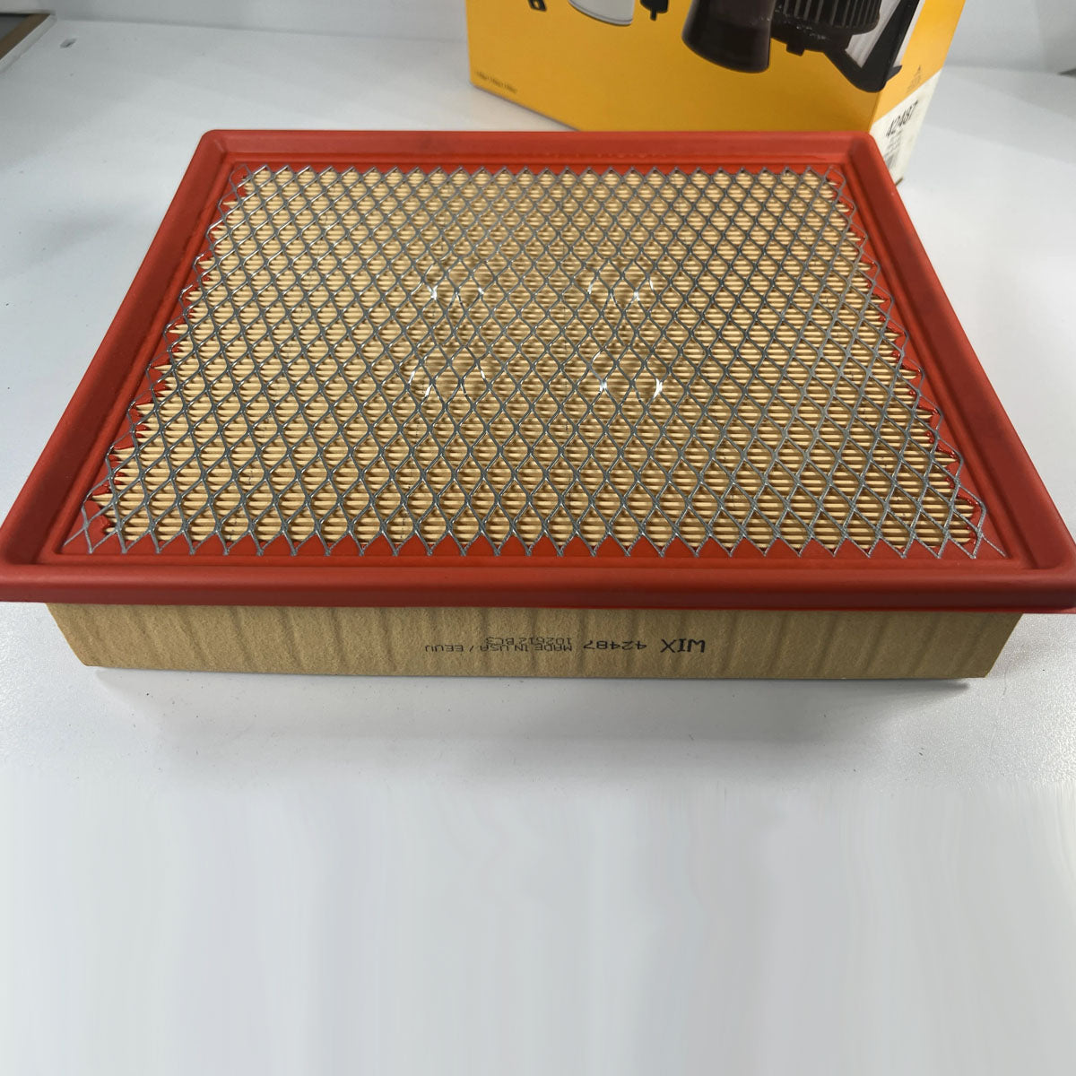Wix 42487 panel engine air filter front view showing pleated filter media