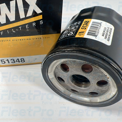 Threaded base plate and inlet holes detail on Wix 51348 spin-on oil filter
